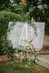 Perspex glass table plan in private garden Surrey