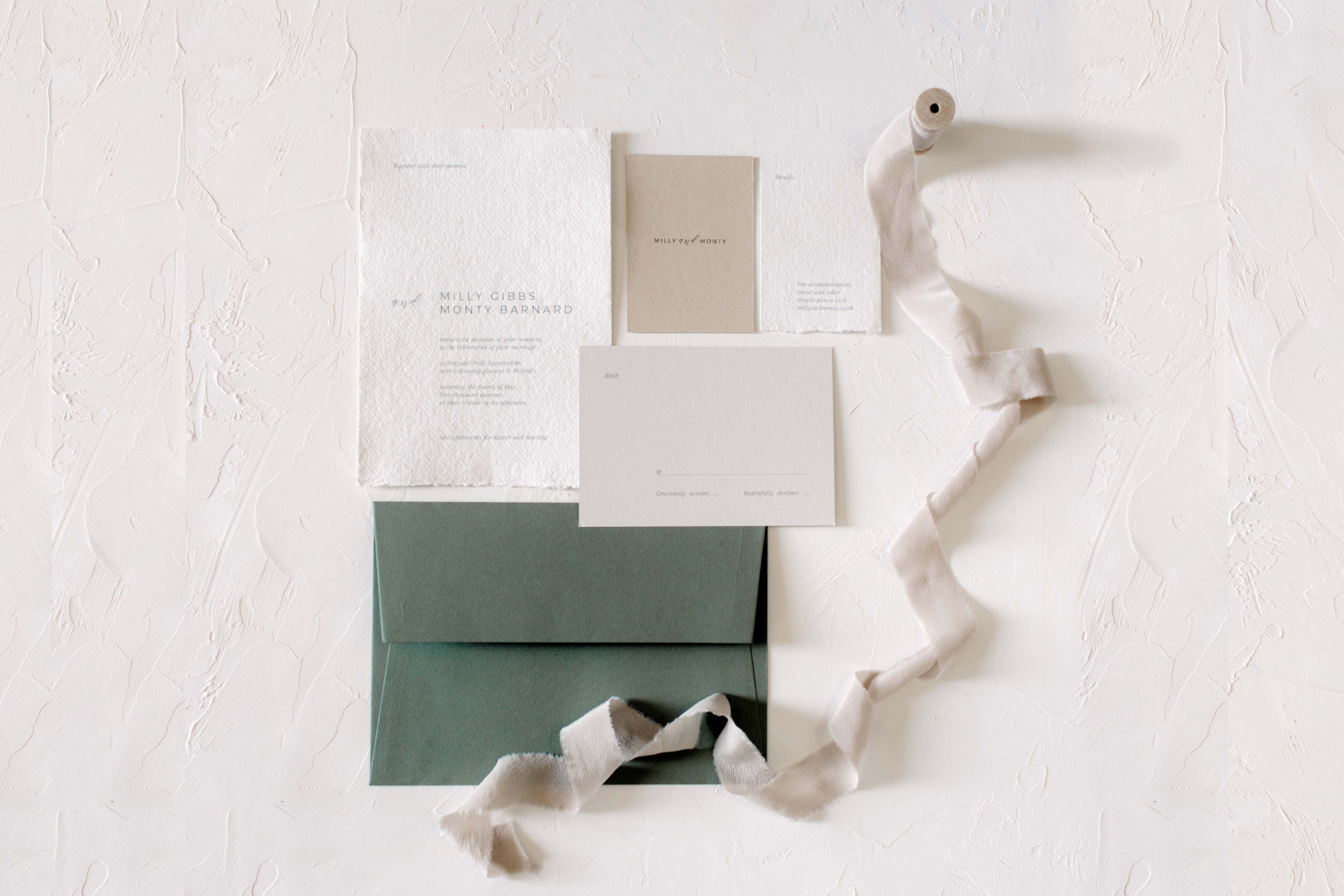 Wedding stationery in a quintessentially English setting at Holywell Hall Stamford