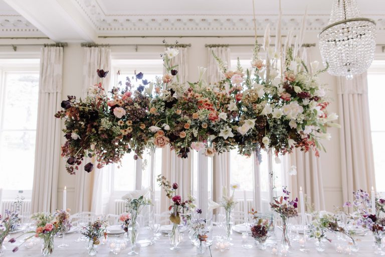 Decedent tablescape at countryside venue Pynes House in Devon